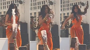 Cardi B hurls microphone at fan during Vegas concert after being splashed by drink