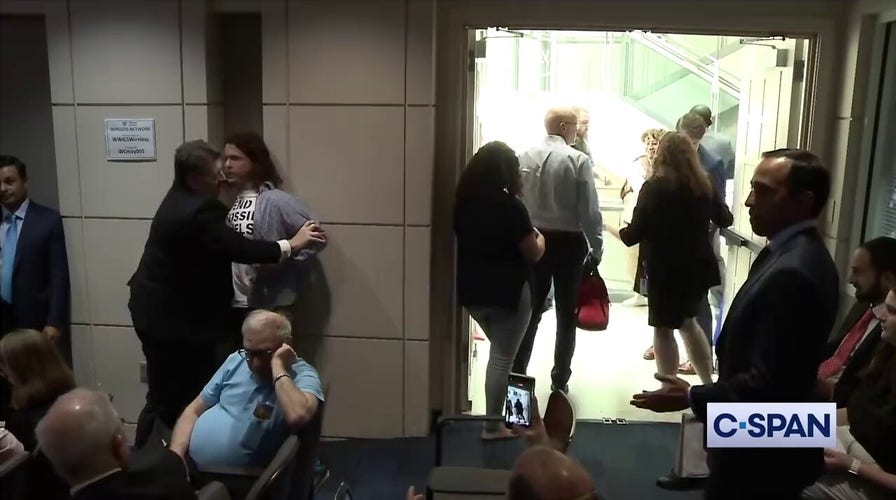 Commerce Secretary Gina Raimondo's talk interrupted by climate change protesters: video